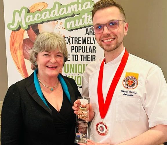 Jill Whyte from Green Farms Nut Company with last year's Young Chef's competition winner.
